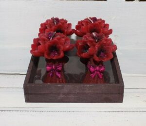 4 velas flores rojas 5x8 cms