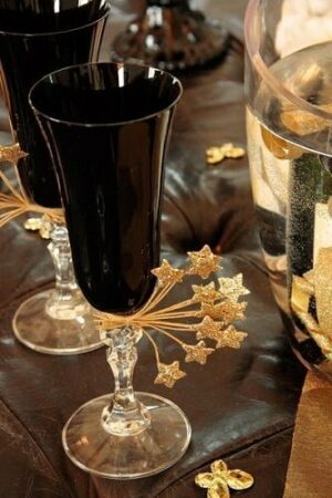 12 Estrellitas pick, con glitter. Varios colores
