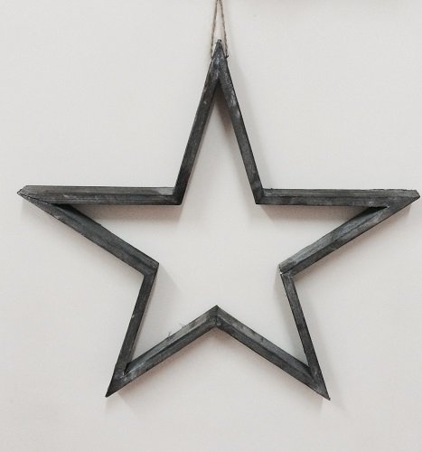 Silueta de estrella de madera gris. 29 cms